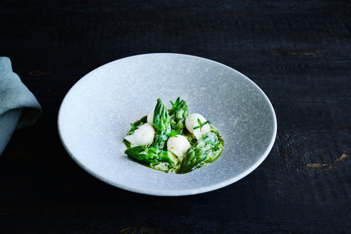 Poached quail eggs with green asparagus, buttermilk and dill